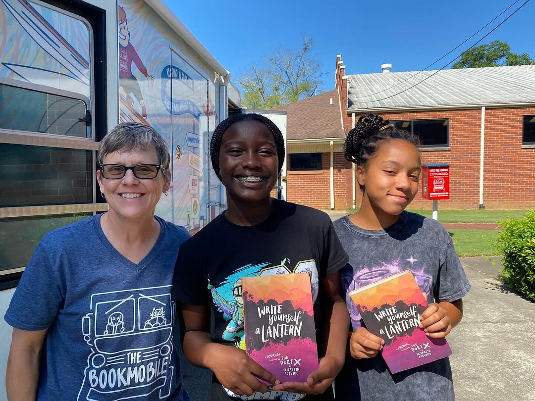 ELW campers with the Bookmobile and books